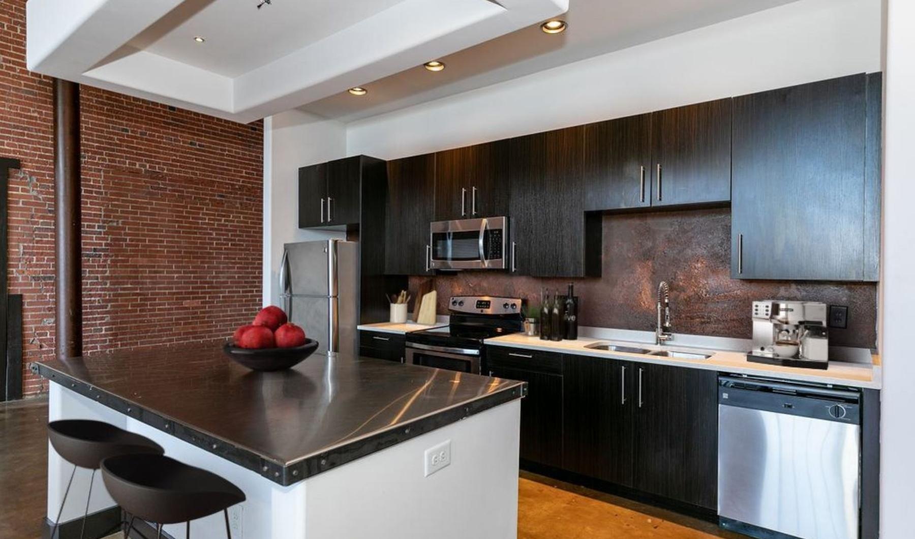 Beautiful kitchens with designer finishes a kitchen with black cabinets